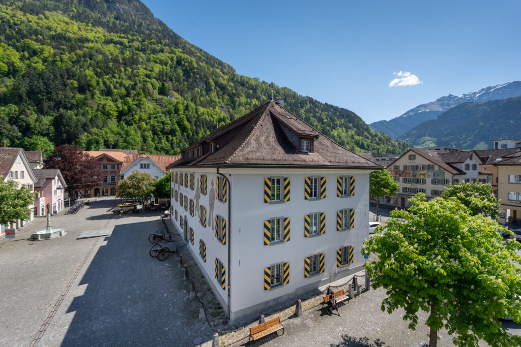 View from Interalps apartment window overlooking Altdorf and the Swiss Alps, near Lake Lucerne and Andermatt.